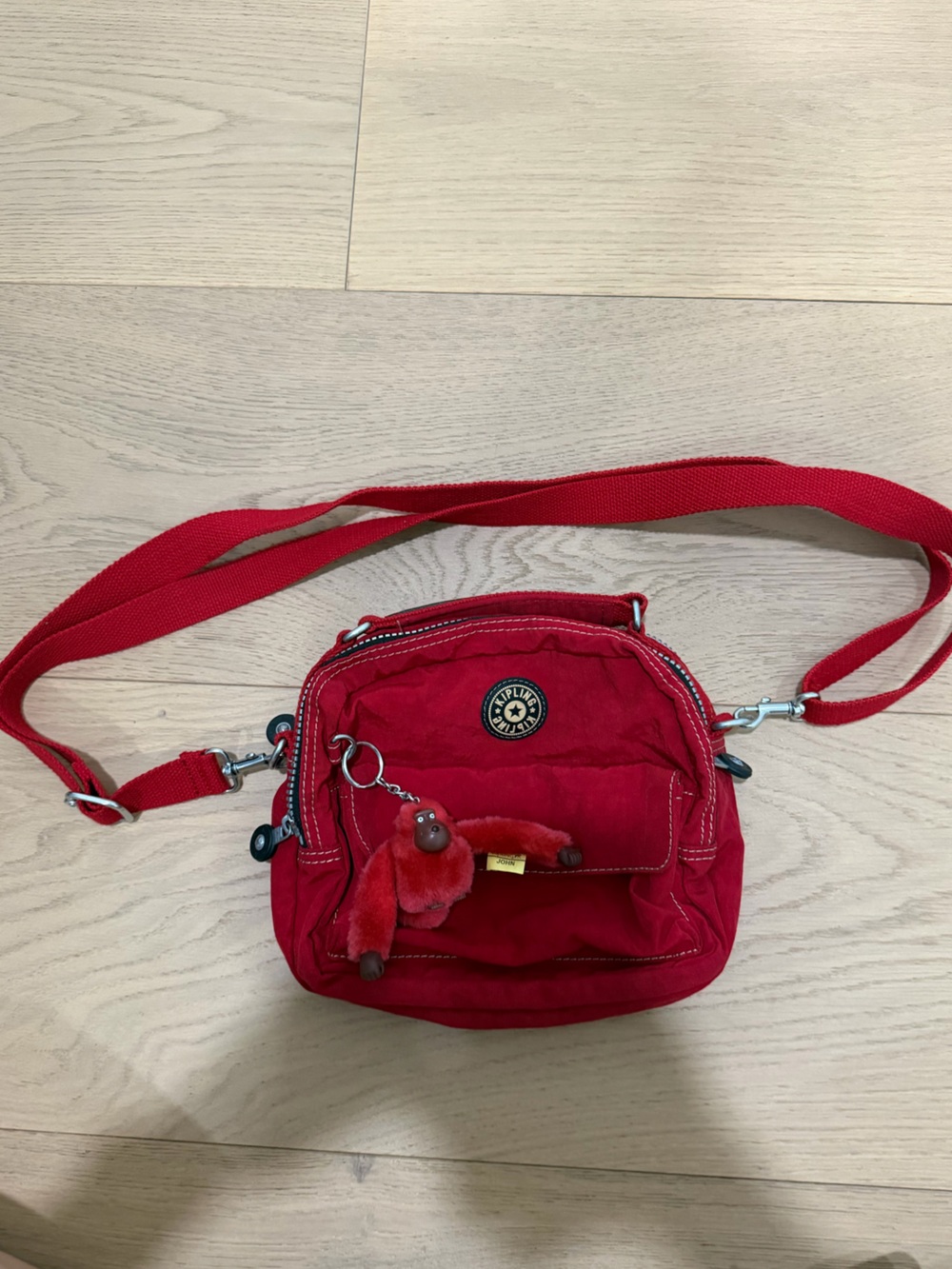 Kipling Bright Red Mini Crossbody with Monkey Charm